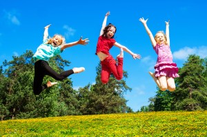 Happy active children jumping