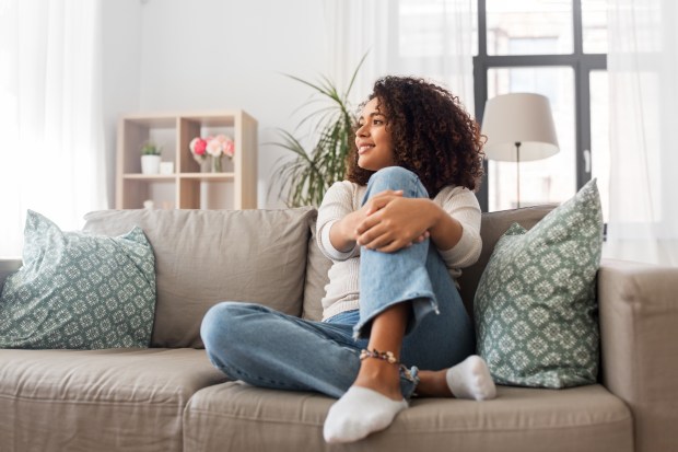 happy african american young woman at home